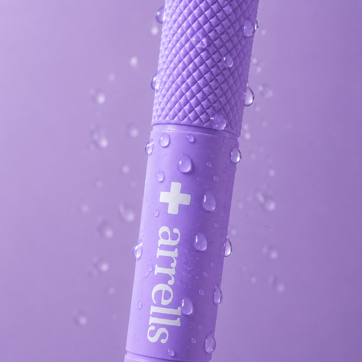 Macro close-up of the arrells knurled handle covered in water droplets.